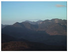 Looking west at Sawteeth Mtn, Mt. Haystack, Little Haystack, Mt. Marcy, Pyramid Peak, Gothics Mtn, Armstrong Mtn