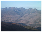 Looking west at Mt. Marcy, Pyramid Peak, Gothics Mtn, Armstrong Mtn, Upper Wolfjaw Mtn, Noonmark Burned Area