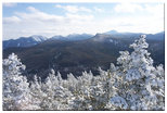 Looking south at Big Slide Mtn, The Brothers, Mt. Marcy, Gray Peak, Mt. Haystack, Little Haystack, Basin Mtn, Saddleback Mtn, Gothics Mtn, Armstrong Mtn, Upper Wolfjaw Mtn, Mt. Phelps