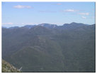 Looking east at Basin Mtn, Gothics Mtn, Armstrong Mtn, Tabletop Mtn, Indian Falls, Upper Wolfjaw Mtn, Saddleback Mtn